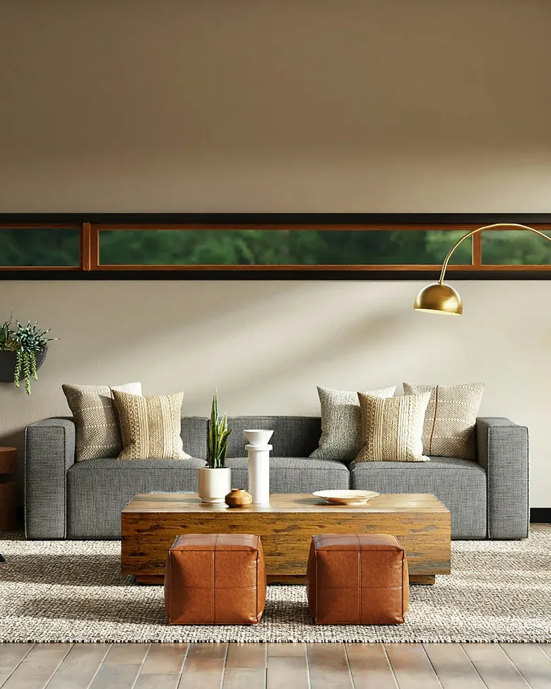Warm minimal lounge with arched lamp